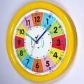 żółty zegar edukacyjny