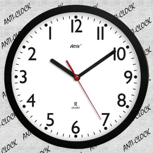 Zegar chodzący do tyłu czarny tarcza biała /25,5cm