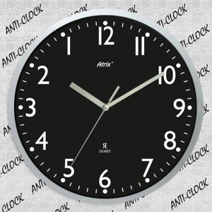 Zegar chodzący do tyłu srebrny tarcza czarna/25,5cm