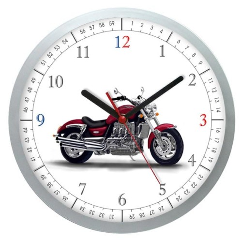Srebrny zegar z motocyklem