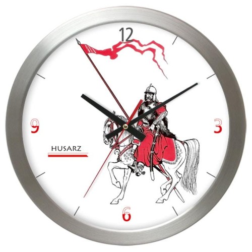 metalowy zegar z husarzem